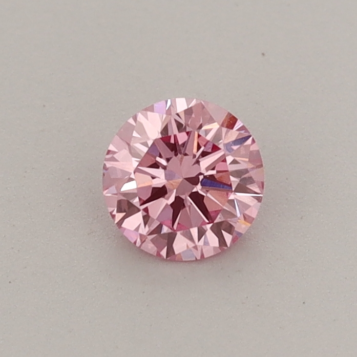 Actual 0.32 carat Fancy Vivid Pink Round lab-grown diamond